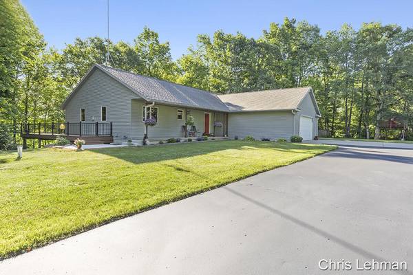 2474 W County Line Road, Sand Lake, MI 49343