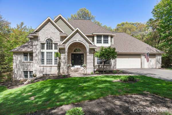 7023 Dunloe NE Court, Belmont, MI 49306