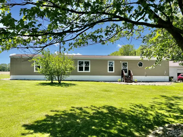 725 W Tupper lake Road, Lake Odessa, MI 48849