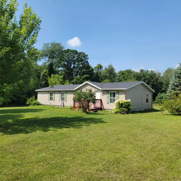 6519 N Hillman Road, Six Lakes, MI 48886