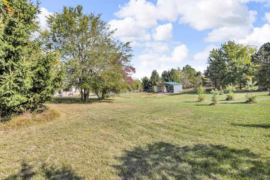 7762 Coon Hill Road, Munith, MI 49259