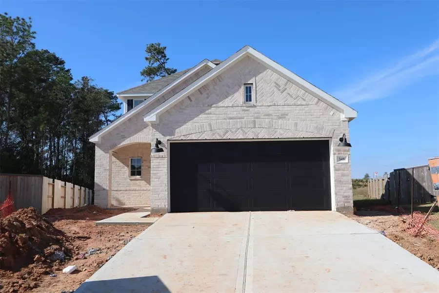 348 Flowering Orchid LN, Willis, TX 77378