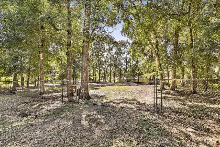 209 Holly LN, Woodbranch, TX 77357