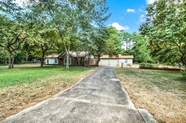 1202 Coe RD, Pinehurst, TX 77362