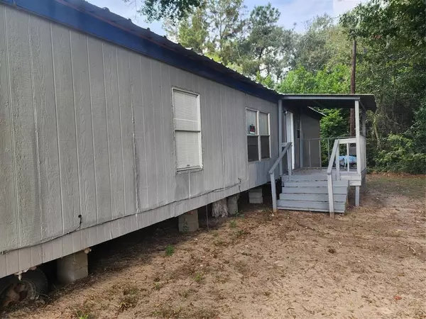 25976 Highway 105 W, Plantersville, TX 77356