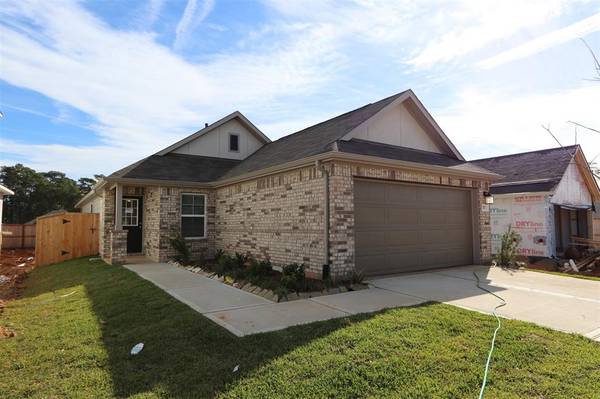 717 Roaring Falls DR, Willis, TX 77378