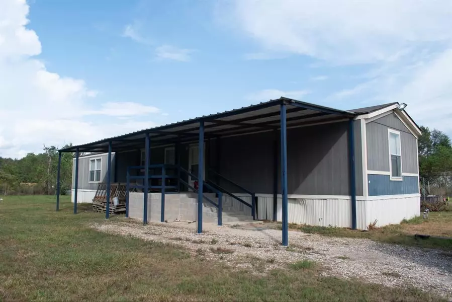 597 County Road 3406, Cleveland, TX 77327