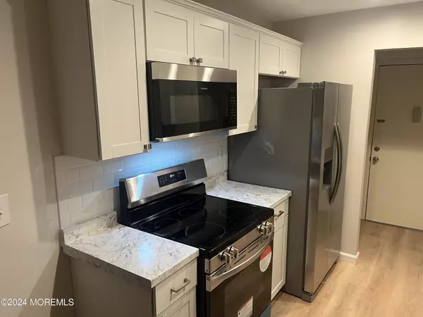 Manalapan, NJ 07726,16 Pine Cluster Circle #E