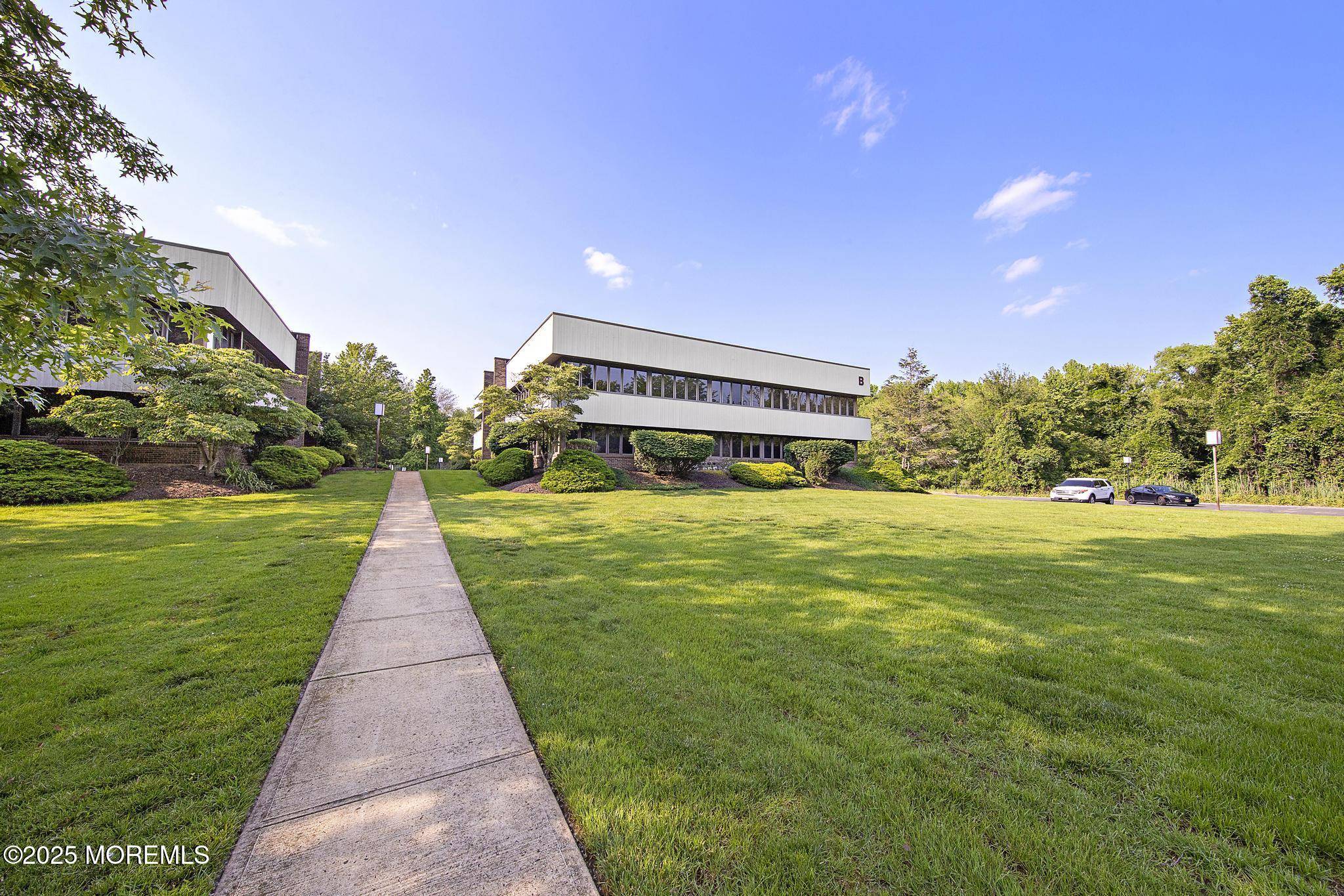 Oakhurst, NJ 07755,257 Monmouth Road #1B & 2B
