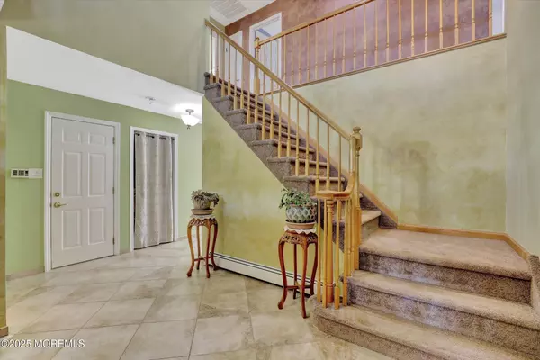 Manalapan, NJ 07726,11 Rowena Road