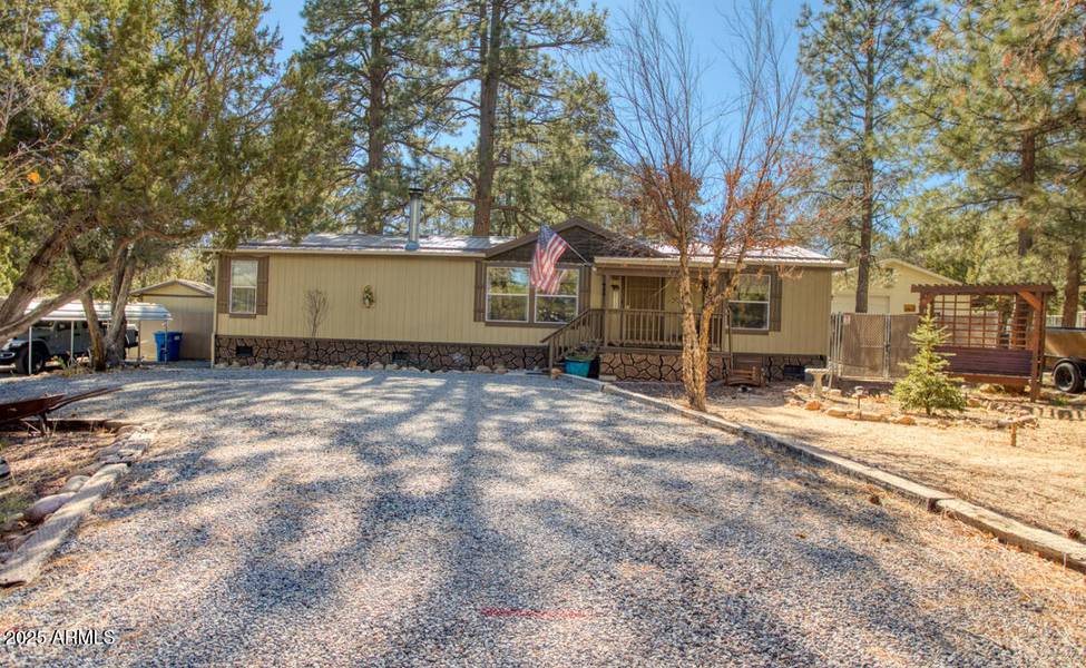 1981 RUSTLING PINE Drive, Overgaard, AZ 85933