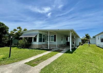 911 Oriole CIR, Barefoot Bay, FL 32976