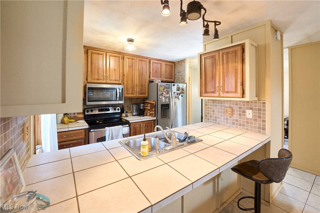 Berea, OH 44017,580 Merrimak DR