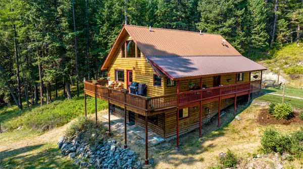 Kila, MT 59920,296 Log Cabin LN