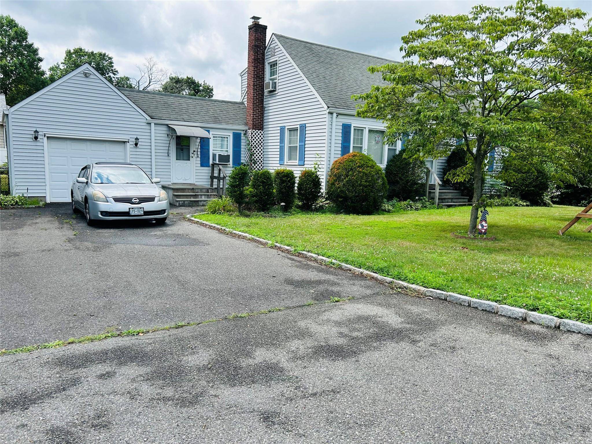 1547 Walt Whitman RD, Melville, NY 11747