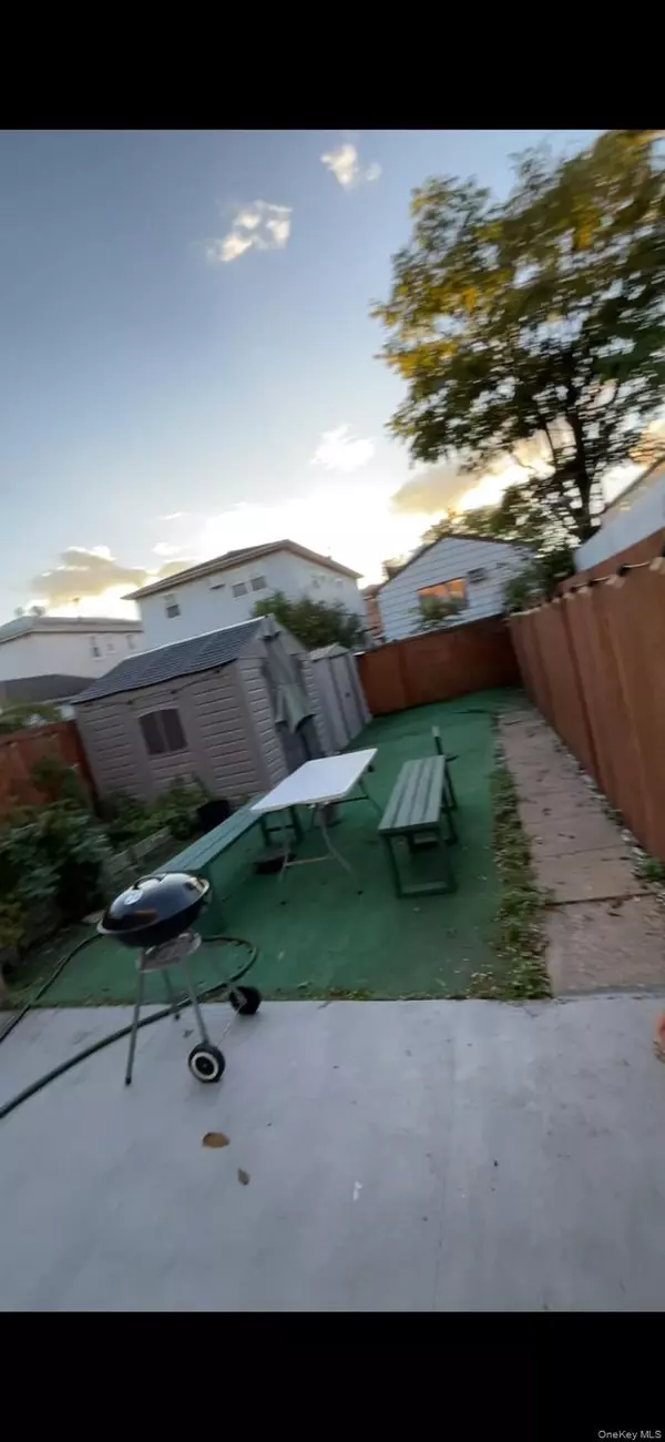 Ozone Park, NY 11417,10518 77th ST