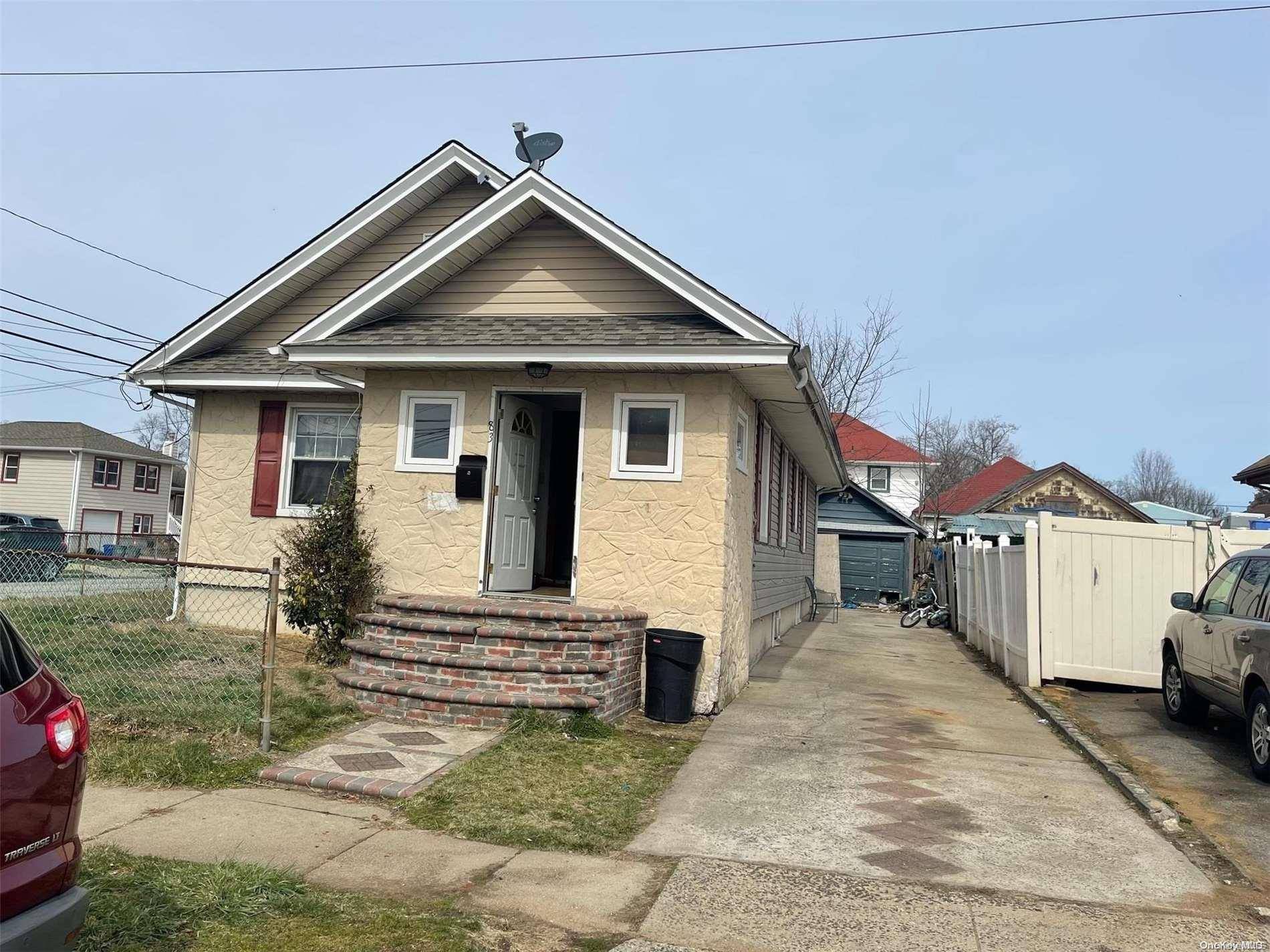 83 Washburn AVE, Freeport, NY 11520