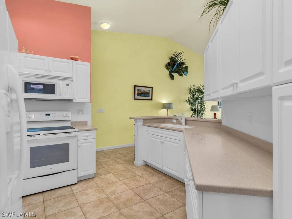 Naples, FL 34114,25065 Peacock LN #202