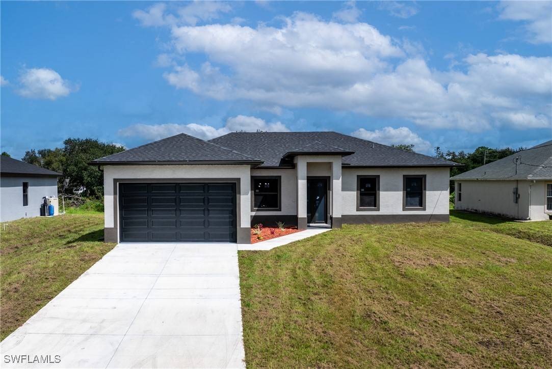 2602 73rd ST W, Lehigh Acres, FL 33971