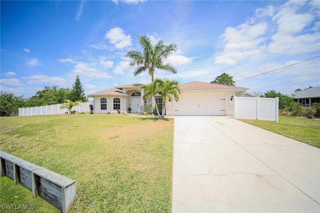 823 Portland ST E, Lehigh Acres, FL 33974
