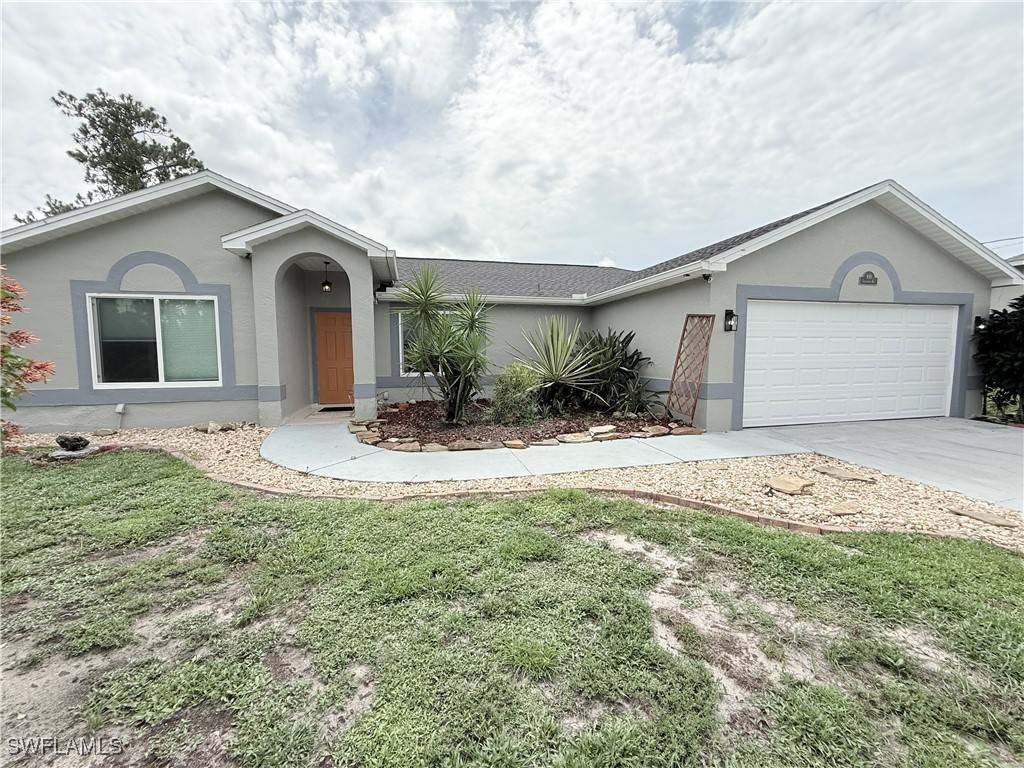 910 Greenwood AVE, Lehigh Acres, FL 33972