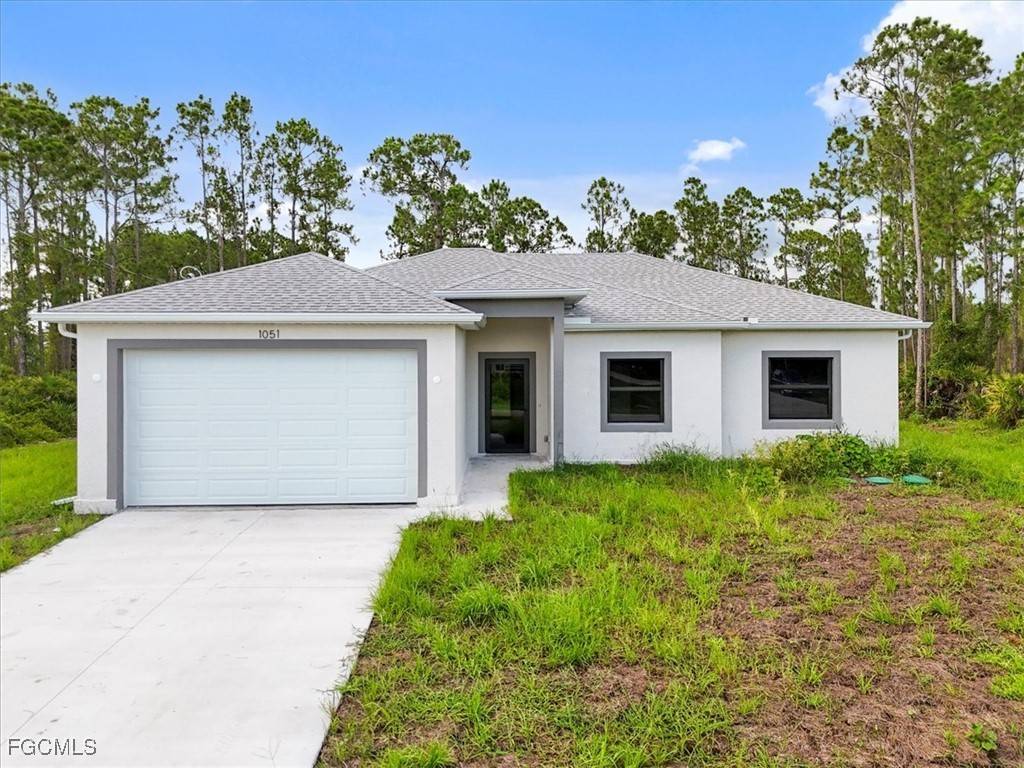 1051 Milwaukee BLVD, Lehigh Acres, FL 33974