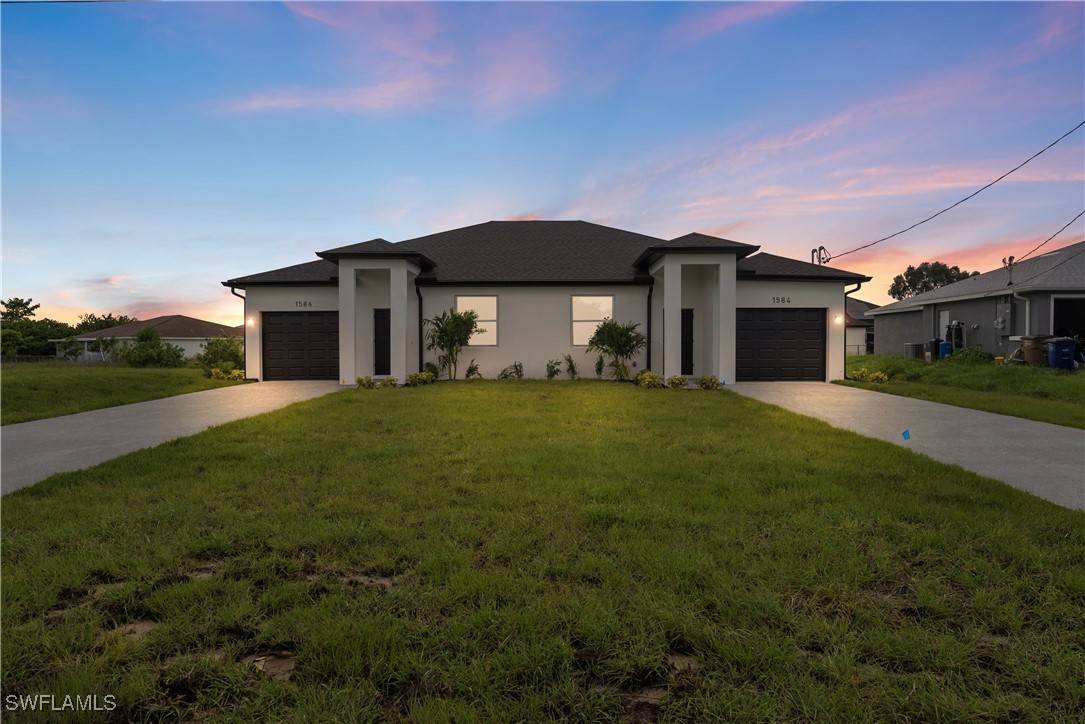 1584/1586 Gretchen AVE S, Lehigh Acres, FL 33973