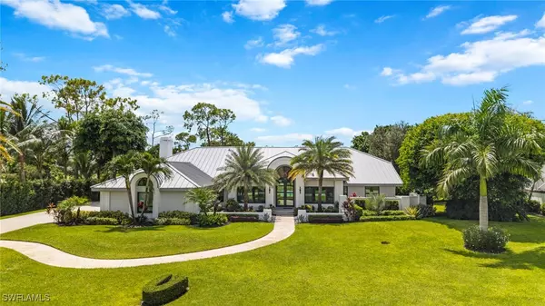 13029 Bald Cypress LN, Naples, FL 34119