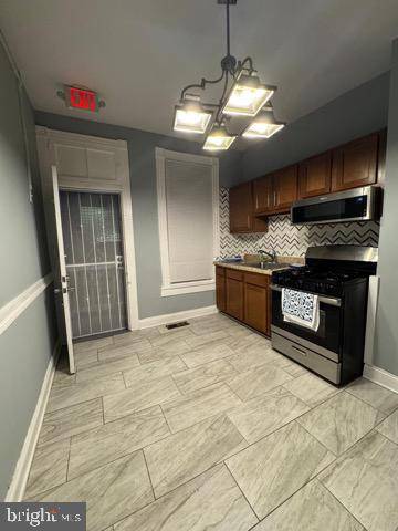 Baltimore, MD 21218,521 E 23RD ST