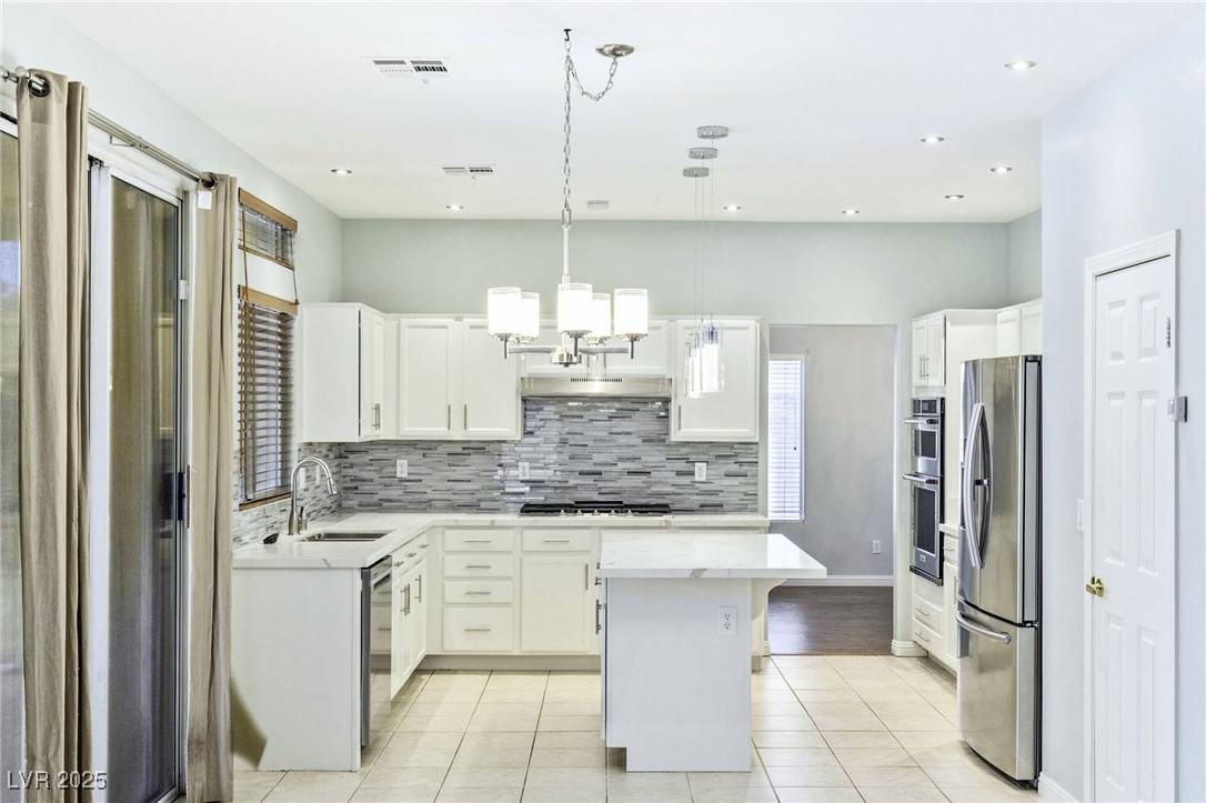 Henderson, NV 89052,1002 Prestige Meadows PL