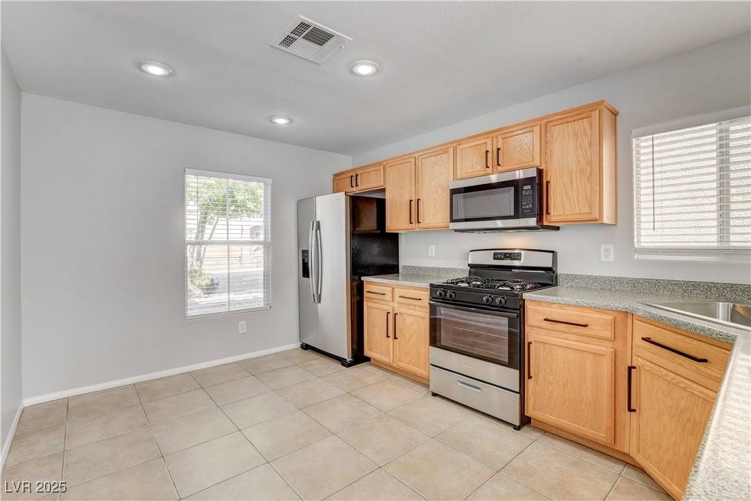 Henderson, NV 89052,881 Blushing Rose PL