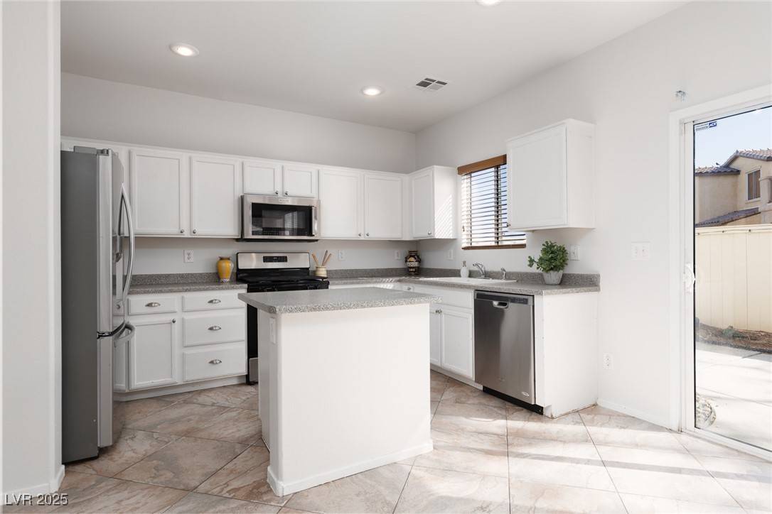 Henderson, NV 89052,908 Shining Rose PL