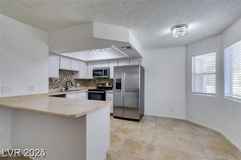 Las Vegas, NV 89128,924 Falconhead LN #102