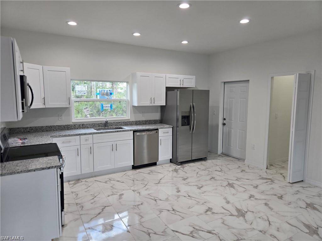 Lehigh Acres, FL 33972,612 Kleinart DR