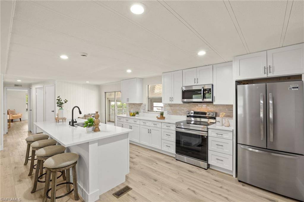 Naples, FL 34104,865 Cape Haze LN