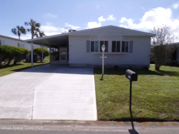 1035 Royal Palm DR, Barefoot Bay, FL 32976