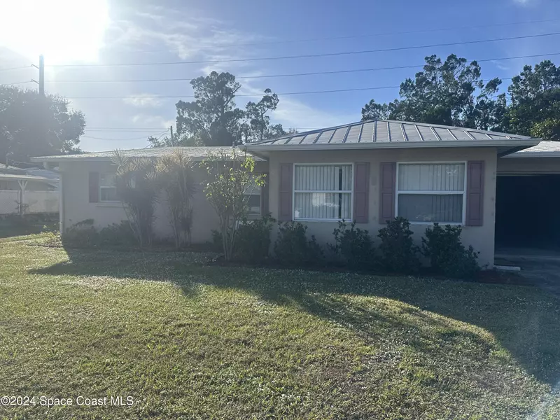 9852 Honeysuckle DR, Micco, FL 32976