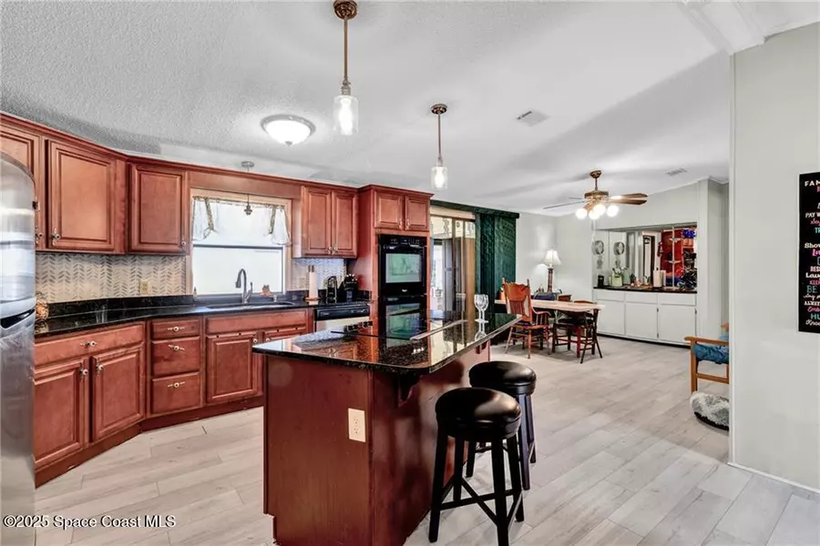 729 Gladiolus DR, Barefoot Bay, FL 32976