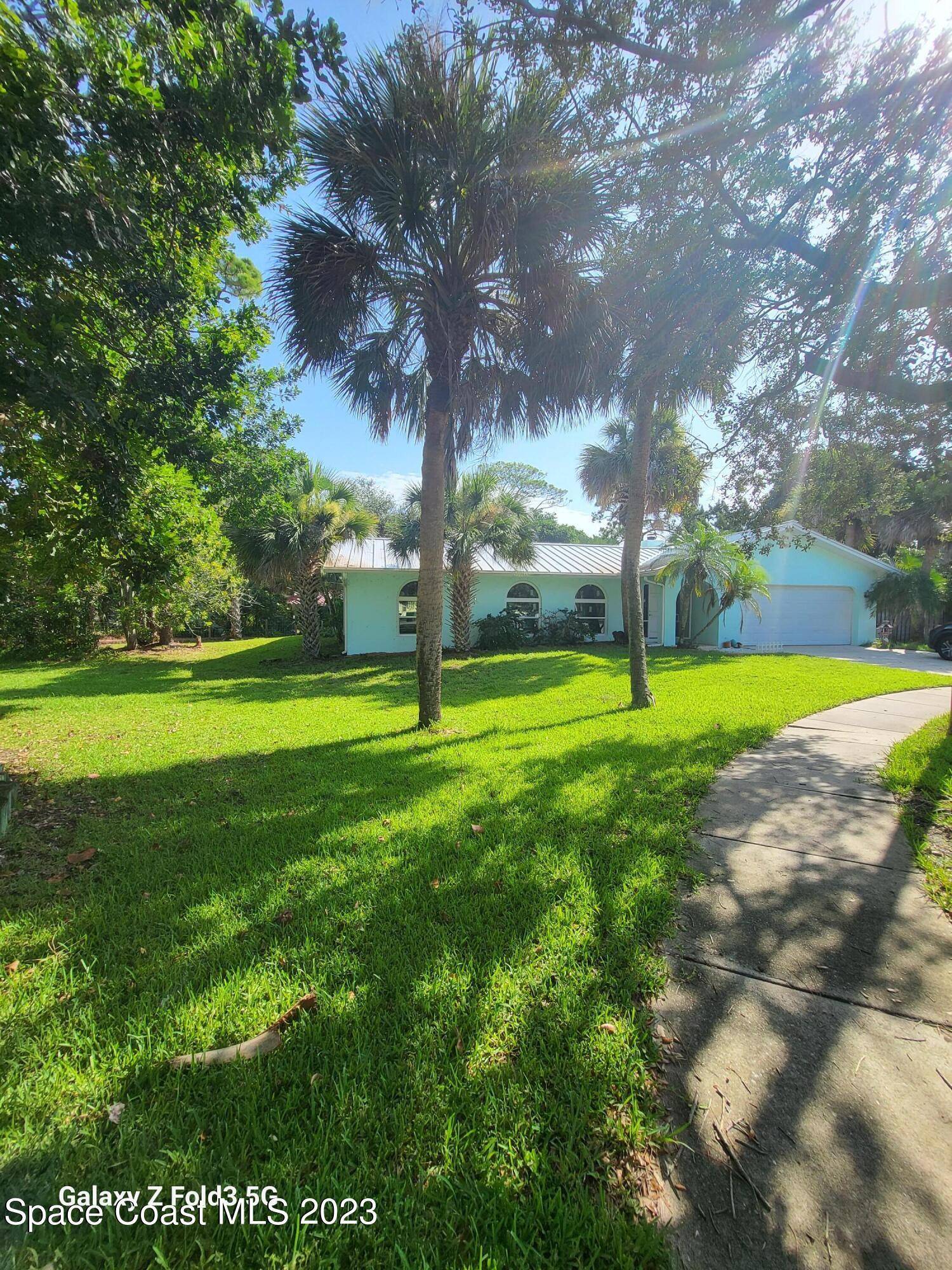 8 Colonial WAY, Indian Harbour Beach, FL 32937