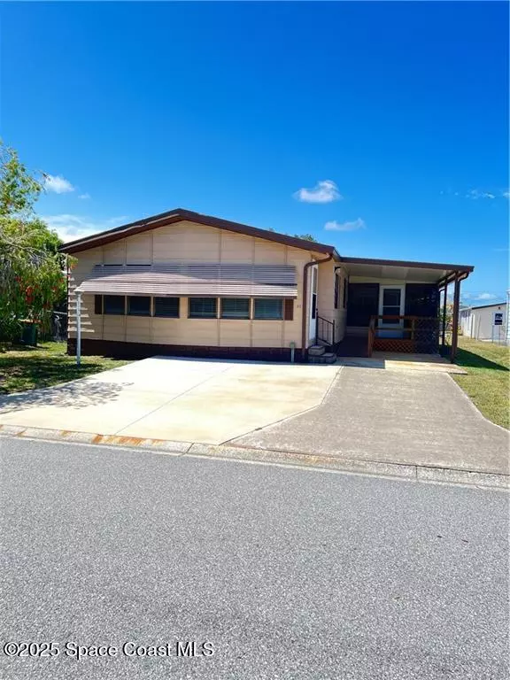 812 Oleander CIR, Barefoot Bay, FL 32976