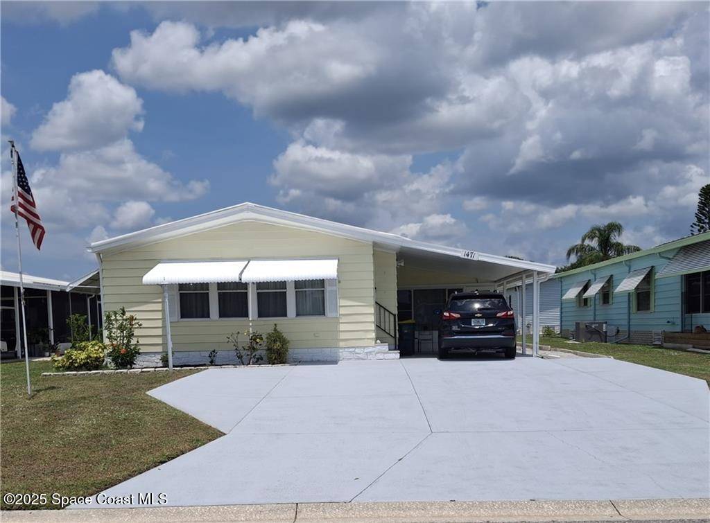 1471 Gardenia DR, Barefoot Bay, FL 32976