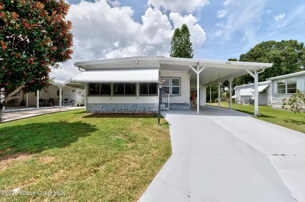 1006 Robin DR, Barefoot Bay, FL 32976