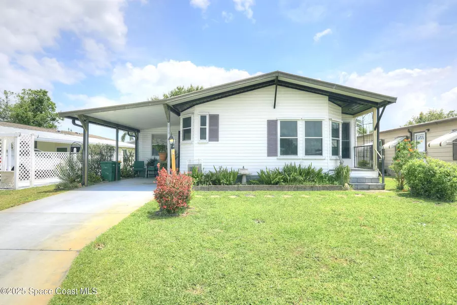 909 Dogwood DR, Barefoot Bay, FL 32976