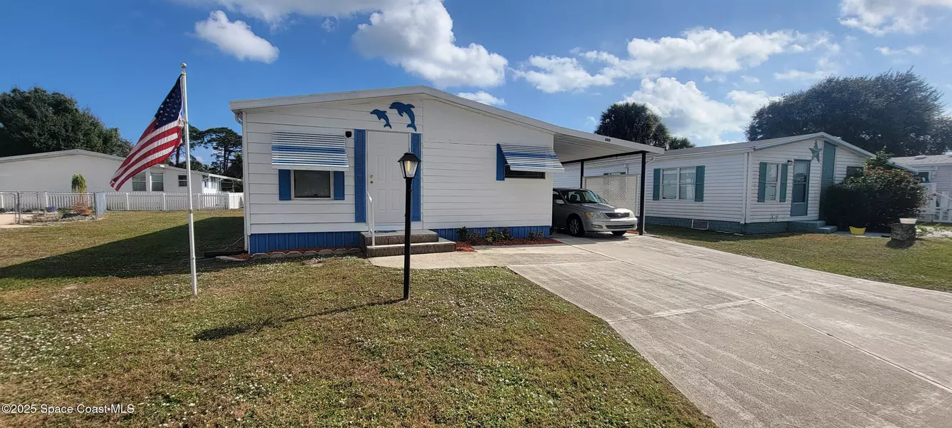 480 Dolphin CIR, Barefoot Bay, FL 32976