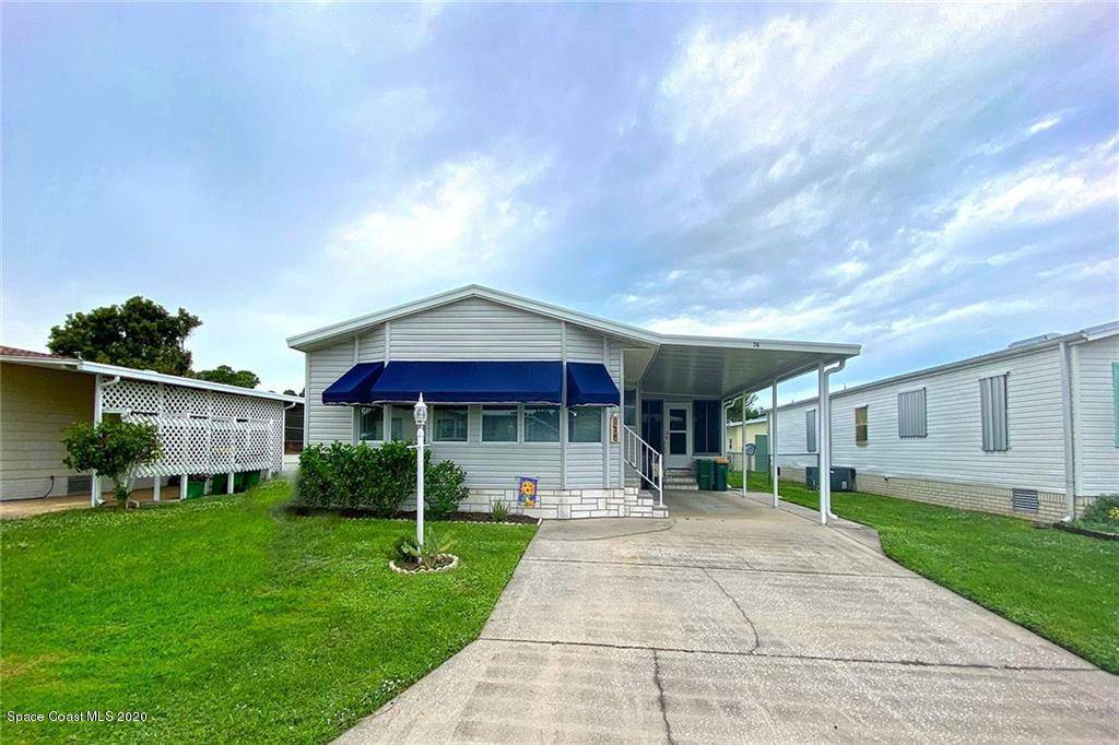 316 Kiwi DR, Barefoot Bay, FL 32976