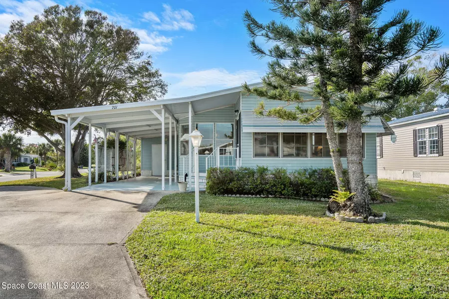 701 Gladiolus DR, Barefoot Bay, FL 32976