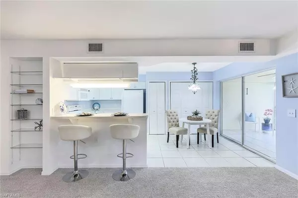 Naples, FL 34110,15465 Cedarwood LN #7-202