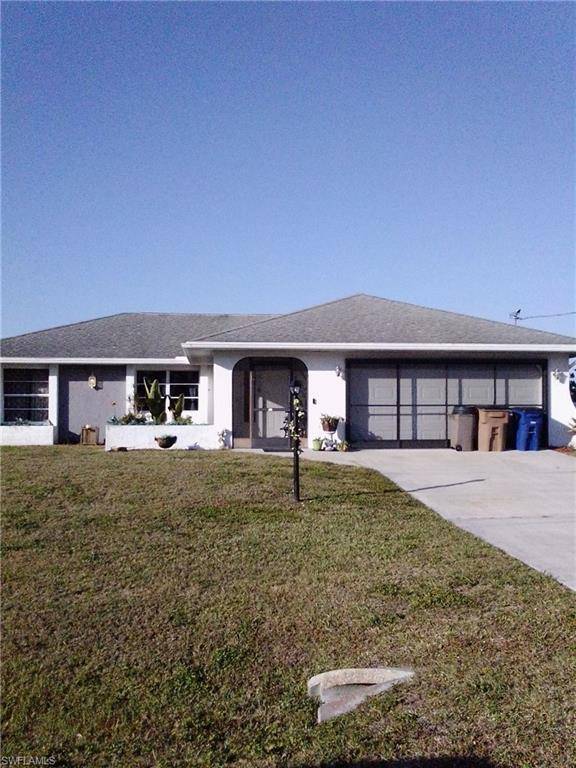 1423 Ford CIR, Lehigh Acres, FL 33936