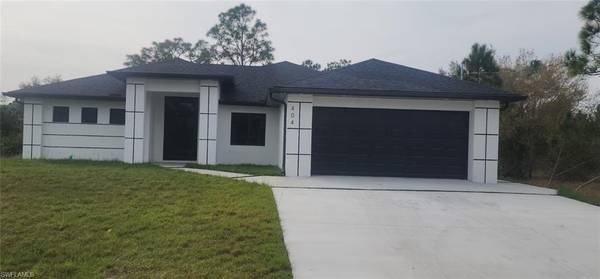 404 Lambda AVE S, Lehigh Acres, FL 33974