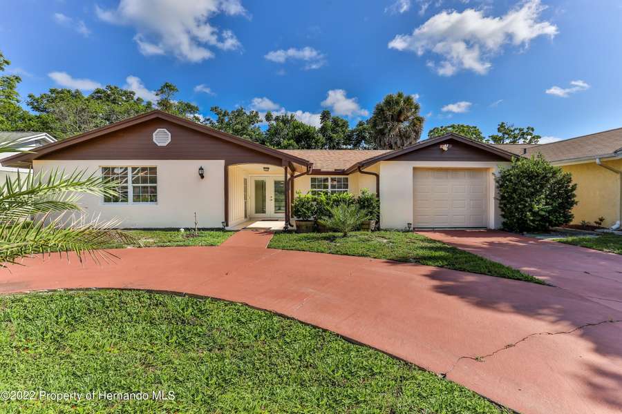 8509 Hunting Saddle Drive, Bayonet Point, FL 34667